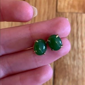 Gold earrings with green stone
